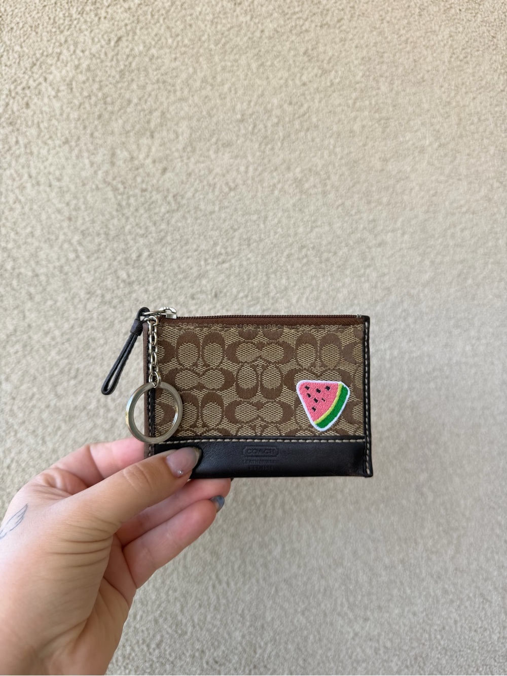 Brown Signature Coach wallet with Watermelon Patch